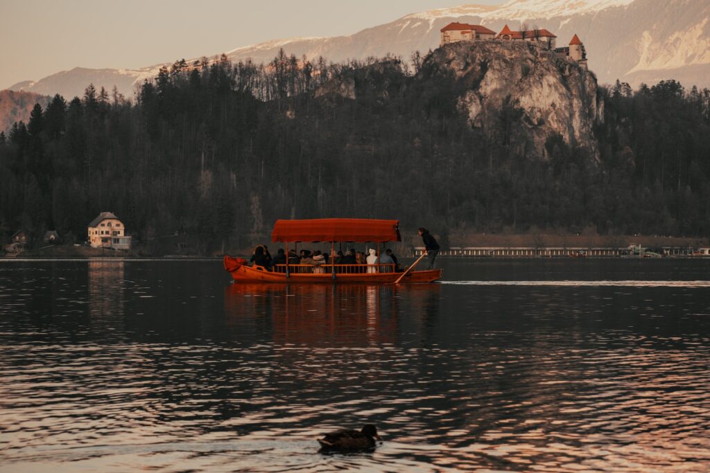 People enjoying a ride on a boat in Slovenia